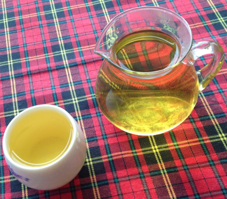 he obligatory and quite delicious oolong tea, served on a typical plaid tablecloth. If anyone can answer what the story is with SE Asia and plaid let me know please! 